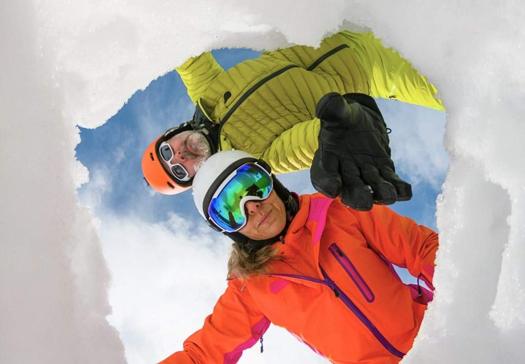 First responders saving a survivor from an avalanche.