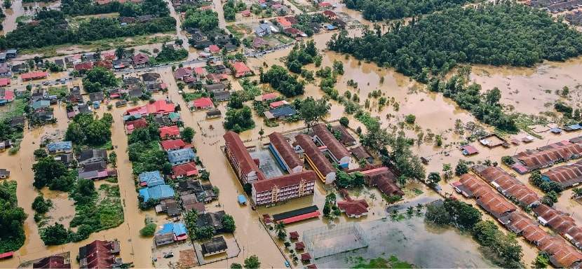 Searching a small town for flood survivors.