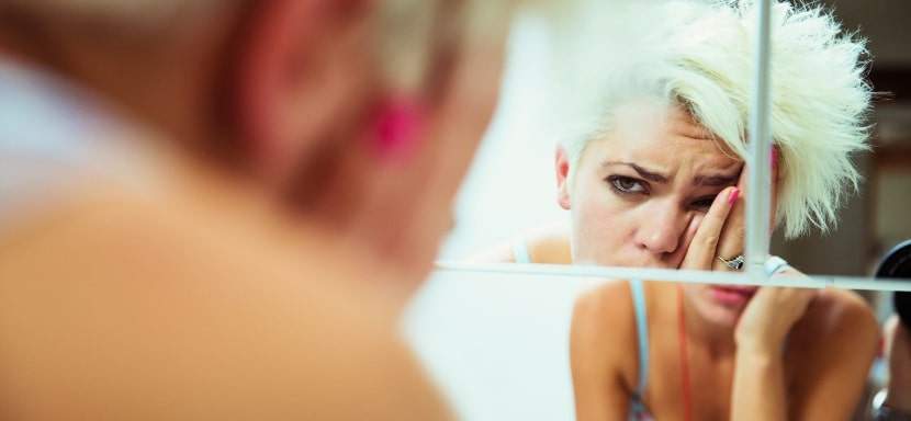 Woman waking up after being drugged.